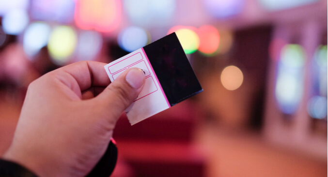 a person holding a movie ticket